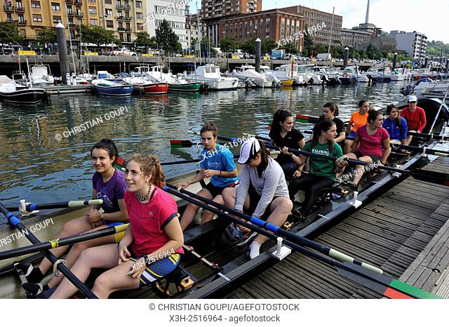 rowing female team at San Sebastian's harbour, Bay of Biscay, province of Gipuzkoa, Basque Country, Spain, Europe