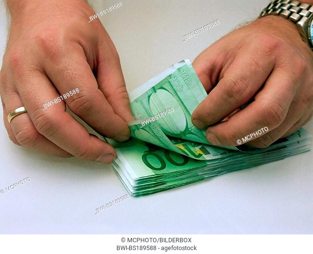 100 Euro banknotes are counted