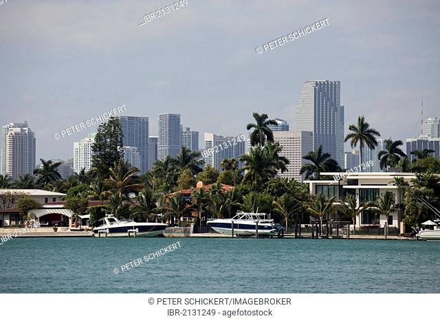 Yachts, villa and the skyline of Miami, Florida, USA