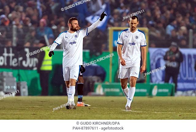 Lotte's Jaroslaw Lindner (l) cheers his 1:0 goal alongside Lotte's Tim Gorschlueter during the round of sixteen DFB Cup match between SF Lotte and TSV 1860...