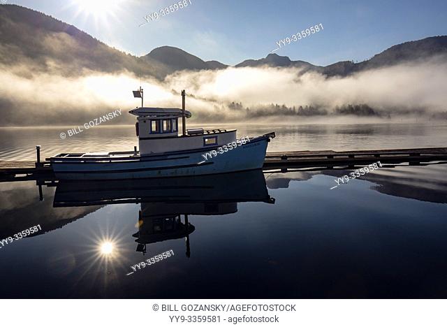 Fishing boat reflections at sunrise - Westview Marina in Tahsis, near Gold River, Vancouver Island, British Columiba, Canada