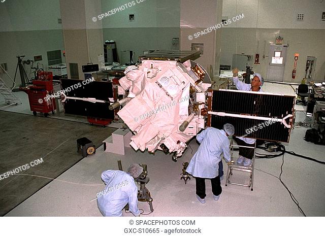 07/24/1997 --- Applied Physics Laboratory engineers and technicians from Johns Hopkins University test solar array deployment of the Advanced Composition...