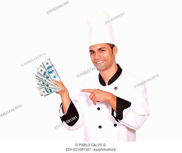 Happy guy in cook uniform holding cash money