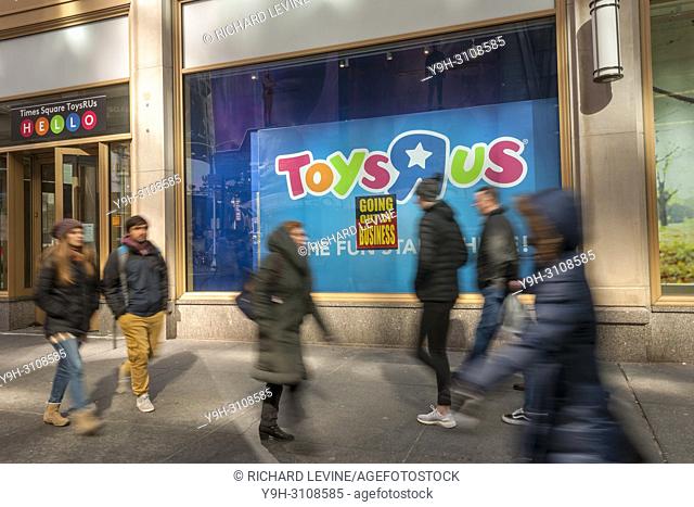 Signs posted on the window of the Toys R Us store in Times Square in New York on Friday, March 23, 2018 announce that the store is closing and liquidation has...