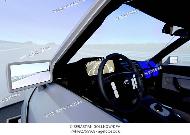 A model car can be seen at the VR driving simulation of the German Aerospace Centre (DLR) in Braunschweig, Germany, 8 August 2016