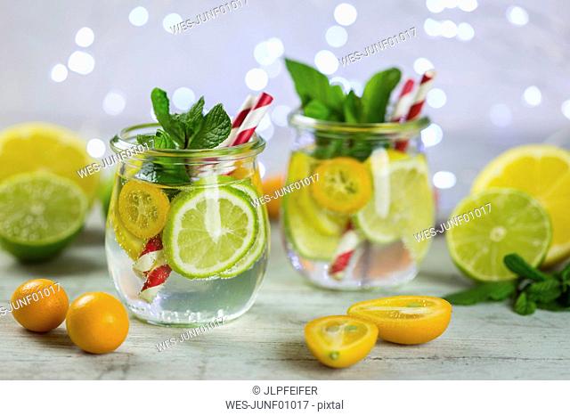 Infused water with lime, lemon, kumquat and mint