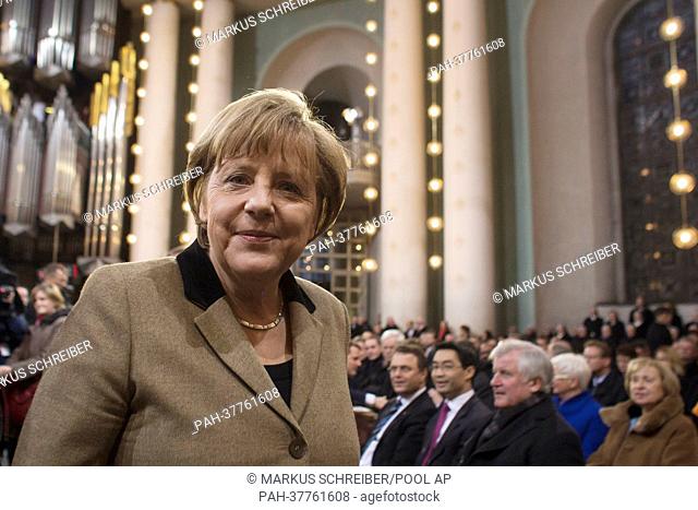 German Chancellor Angela Merkel arrives at a thanksgiving service for outgoing pope Benedict XVI. at the St. Hedwig cathedral in Berlin, Thursday, Feb