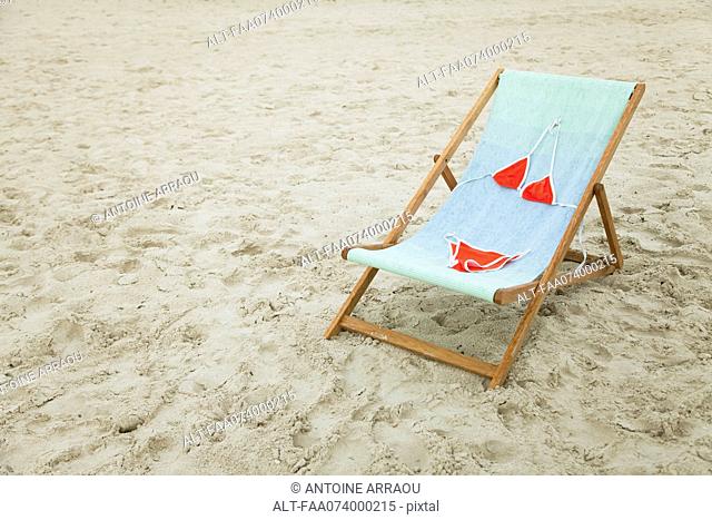 Bikini left on lounge chair at the beach