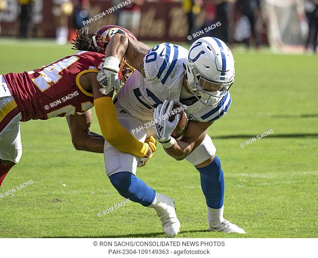 Indianapolis Colts running back Jordan Wilkins (20) tries to advance the ball after making a reception in fourth quarter action against the Washington Redskins...