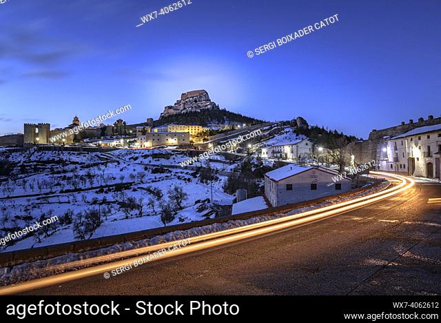Morella medieval city in a winter blue hour / dawn, after a snowfall (Castellón province, Valencian Community, Spain)