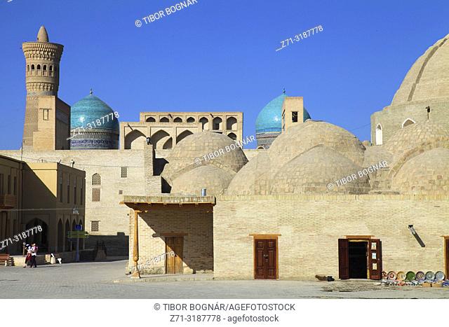 Uzbekistan; Bukhara; skyline, Kalon Minaret, Toki Zaragon, bazaar, domes,
