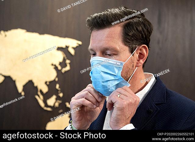 Batist Medical President & CEO Tomas Mertlik presents face masks to0 journalists during PM's visit in the region, on Wednesday, February 26, 2020