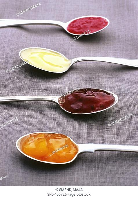Apricot, raspberry and strawberry jam and lemon curd