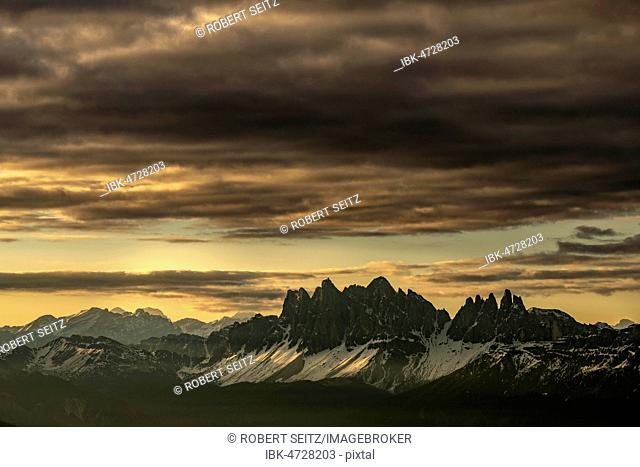 Sunrise with dramatic clouds over South Tyrolean mountain range, Sarntal Alps, San Martino, Sarntal, South Tyrol, Italy
