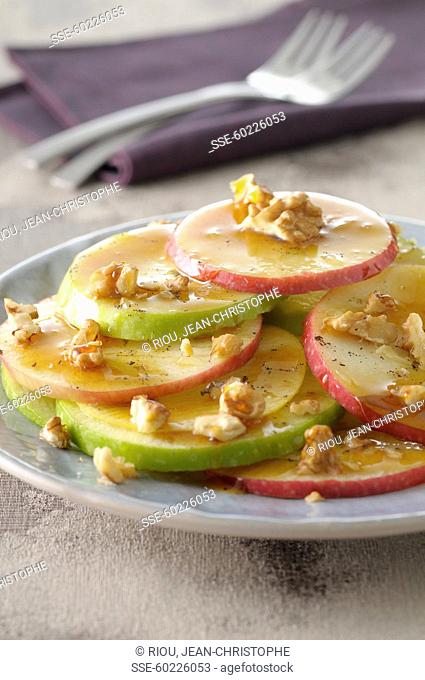 Thinly sliced apples with honey and walnuts