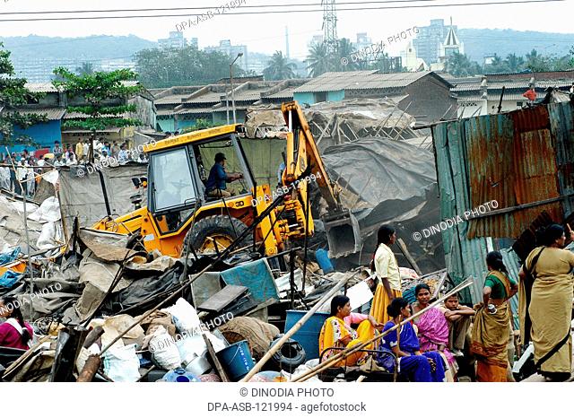 Demolition of illegal slums on the Mankhurd Link Road in Bombay now Mumbai ; Maharashtra ; India