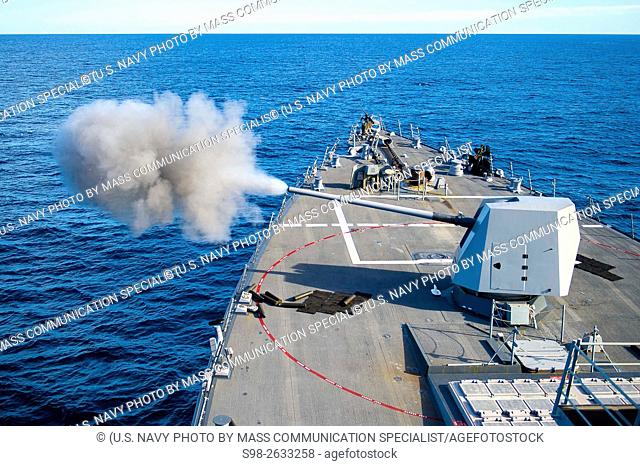 PACIFIC OCEAN (Nov. 12, 2015) The guided-missile destroyer USS Spruance (DDG 111) fires its Mk-45 Mod. 4 five-inch gun during a live-fire exercise