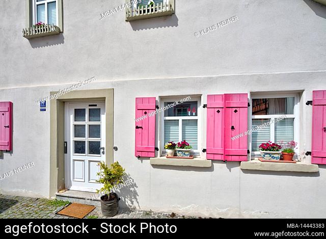 House facade, front door, shutter, floral decoration, urban architecture, early summer, Haßfurt, Franconia, Bavaria, Germany, Europe