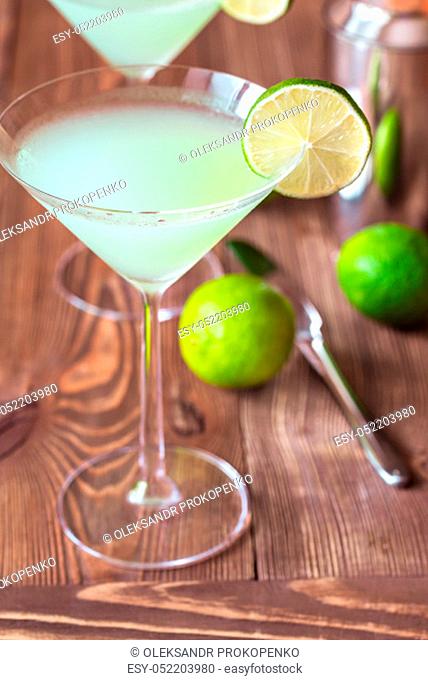 Cocktail glass of classic daiquiri on the wooden background