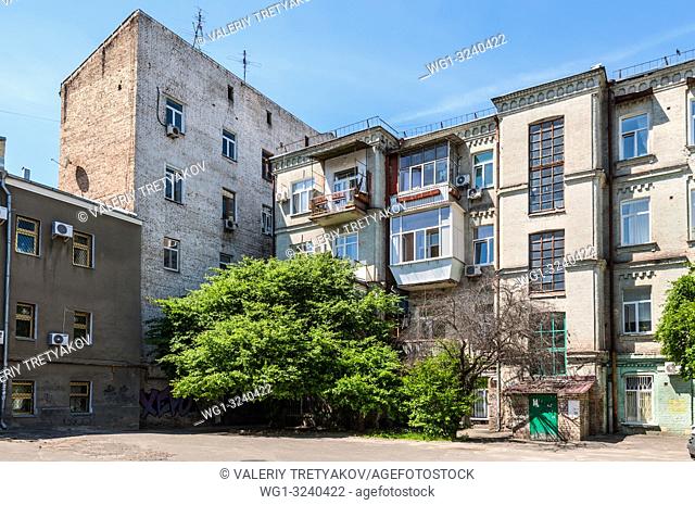 Kyiv, Ukraine - May 10, 2015: Exterior of residential buildings in the historic district called Podil (Podol), Kyiv downtown (Stalin era housing in Kyiv/Kiev)