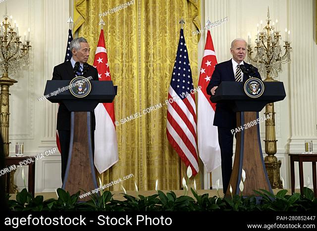 U.S. President Joe Biden speaks during a joint statement with Lee Hsien Loong, Singapore's prime minister, left, in the East Room of the White House in...
