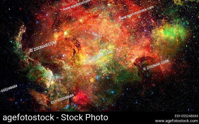 Nebula and stars in deep space. Bursting galaxy. Elements of this image furnished by NASA