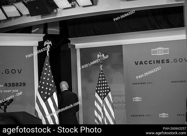 United States President Joe Biden departs the stage following his update on the COVID-19 response and the vaccination program in the South Court Auditorium on...