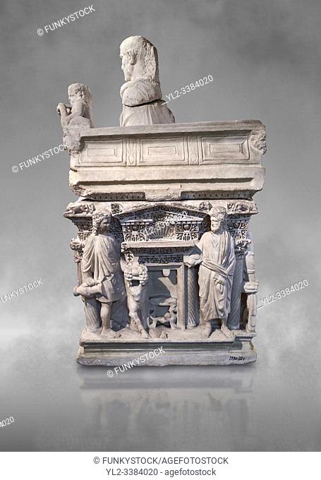 End panel of a Roman relief sculpted sarcophagus with kline couch lid with a reclining male figuer depicted, ""Columned Sarcophagi of Asia Minors'style typical...