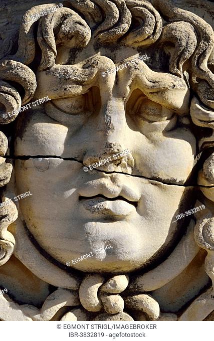 Antique Medusa or Gorgon head at the Apollon temple, archaeological site of Didyma, Ionia, Aydin Province, Turkey