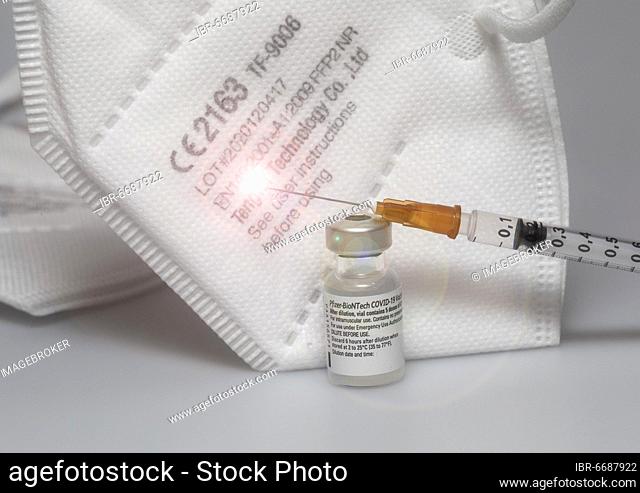 FFP2 masks, Corona protective masks, Vaccine vials from Pfizer-BioNTech, Pfizer, BIONTECH, against Covid 19, Syringe