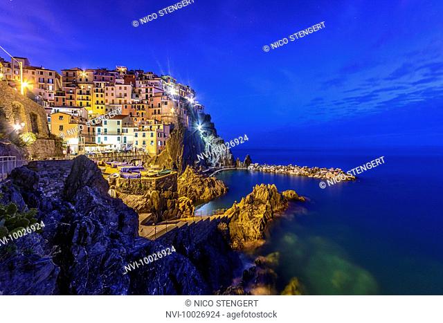 The village Manarola at dusk, Cinque Terre, Riviera di Levante, province of La Spezia, Ligurian Sea, Italian Riviera, Mediterranean Sea, Liguria, Italy