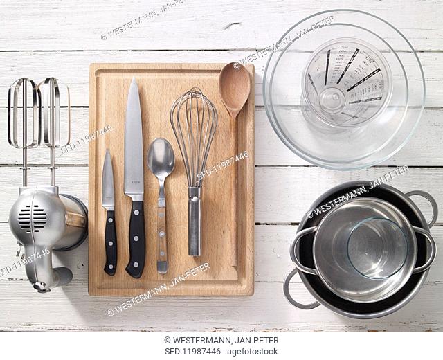 Kitchen utensils for preparing rhubarb compote with vanilla cream