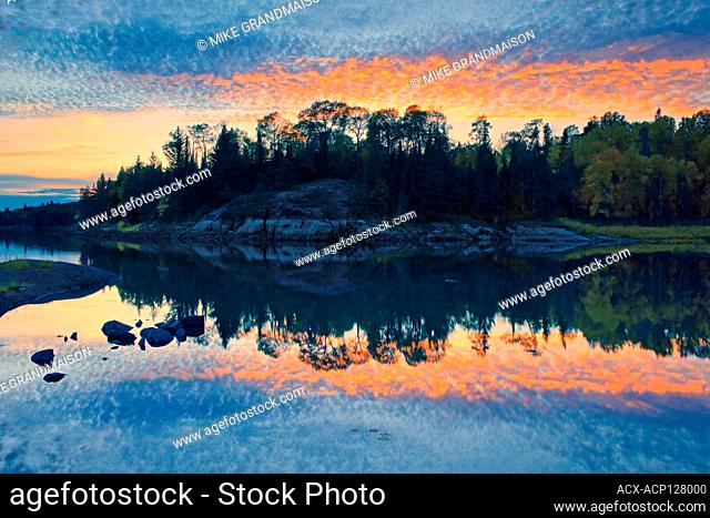 Sunset reflection on Middle Lake, Kenora, Ontario, Canada
