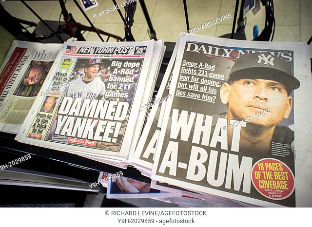Headlines of New York newspapers are seen on Tuesday, August 6, 2013 reporting on Major League Baseball's suspension of NY Yankee Alex Rodriguez for 211 games...
