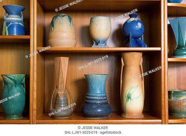 COLLECTION DISPLAY: shelf display of Roseville's Futura art pottery, made only in the year 1928, highly sought