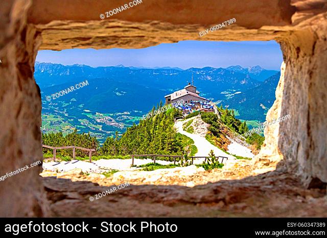 Eagle's Nest or Kehlsteinhaus hideout on the rock above Alpine landscape view through stone window, Berchtesgadener Land, Bavaria, Germany