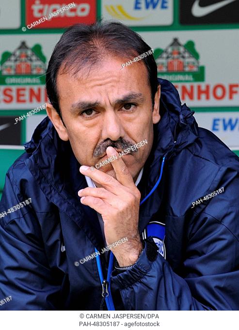 Hertha's head coach Jos Luhukay sits on the bench before the Bundesliga soccer match between Werder Bremen and Hertha BSC at Weserstadium in Bremen, Germany