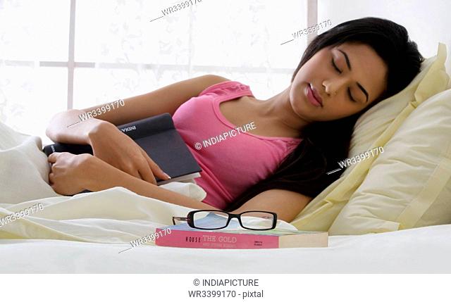 Girl taking a nap in bed