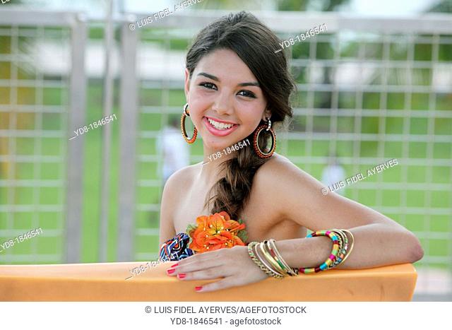 Young woman looking at the camera smailing, Miami Beach, Florida, USA