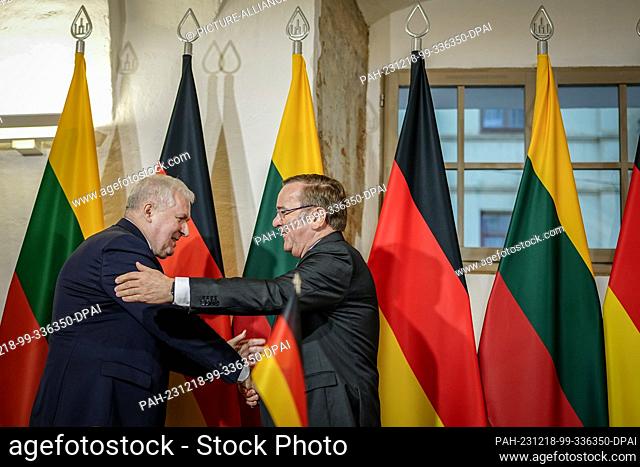 18 December 2023, Lithuania, Vilnius: Boris Pistorius (r, SPD), Federal Minister of Defense, and Arvydas Anu·auskas, Minister of Defense of Lithuania