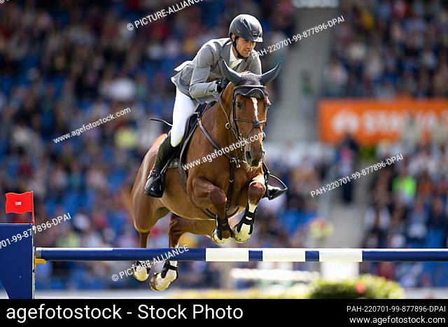 01 July 2022, North Rhine-Westphalia, Aachen: Equestrian sport, jumping: CHIO, Prize of North Rhine-Westphalia. The German rider Christian Kukuk on the horse...