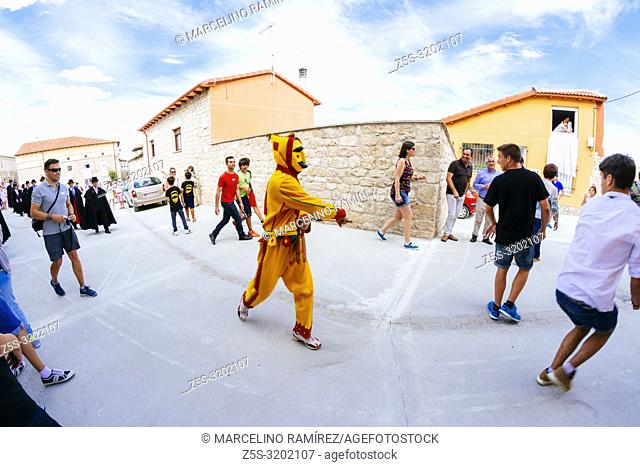 El Colacho chases the village youngsters with his whip during the Fiesta del Colacho in Castrillo de Murcia, Burgos, Castilla y Leon, Spain, Europe