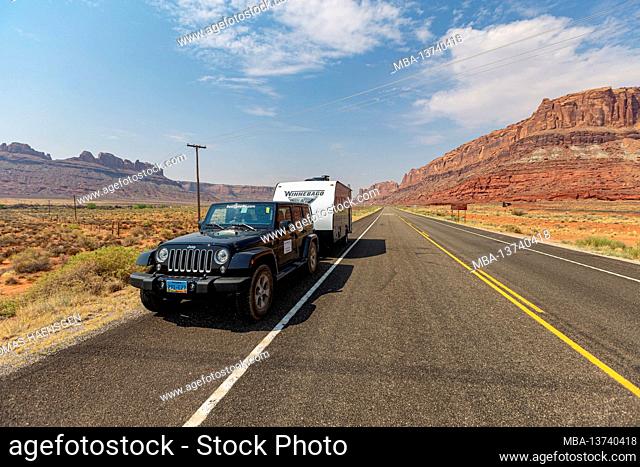 Scenic view on UT-313 with a wrangler jeep and caravan / Trailer. Moab, Utah, USA