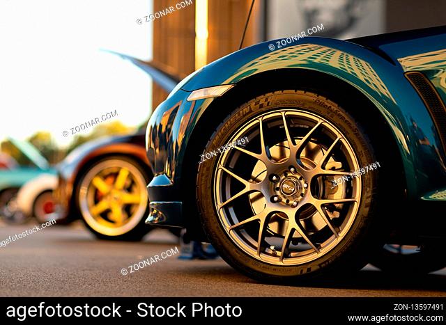 Springfield, Illinois, USA - September 22, 2018: The Route 66 Mother Road Festival, Front wheel close up of a 2007 Mazda RX-8 on the streets of downtown...
