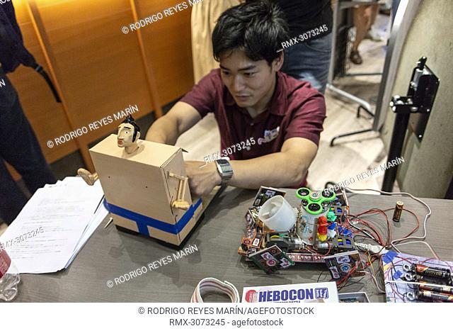 June 30, 2018, Tokyo, Japan - A Hebocon robot operator makes the last adjustments on his low-tech robot before the Hebocon 2018 contests at Tokyo Culture...