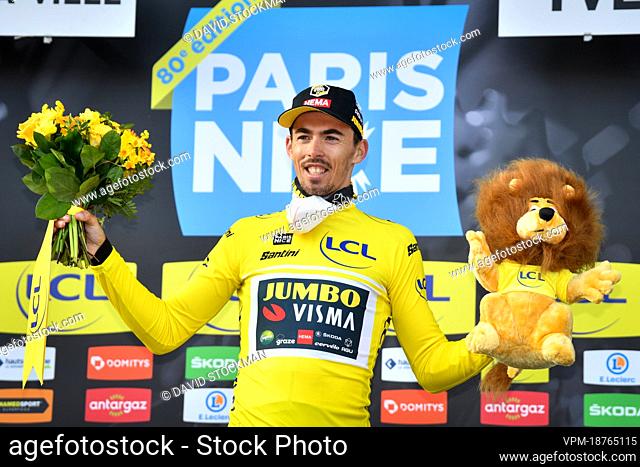 French Christophe Laporte of Jumbo-Visma celebrates on the podium in the yellow jersey of leader in the overall ranking after the first stage of 80th edition of...