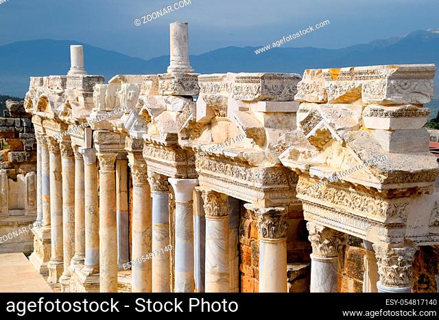 Bas-reliefs of antique scenes on the gables of the amphitheater in Hierapolis, Turkey. Ancient antique amphitheater in the city of Hierapolis in Turkey