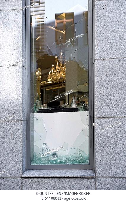 Break-in, broken display window of a jeweller's shop