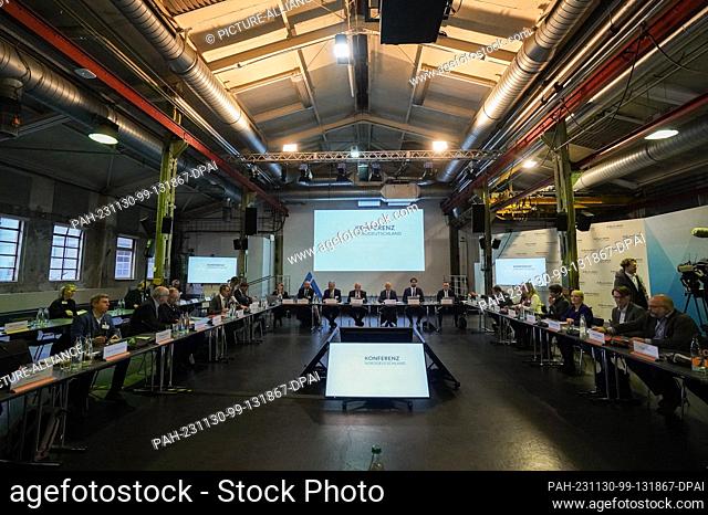 30 November 2023, Hamburg: The participants of the Energy Convention as part of the Northern Germany Conference (KND) sit together in the conference room on the...
