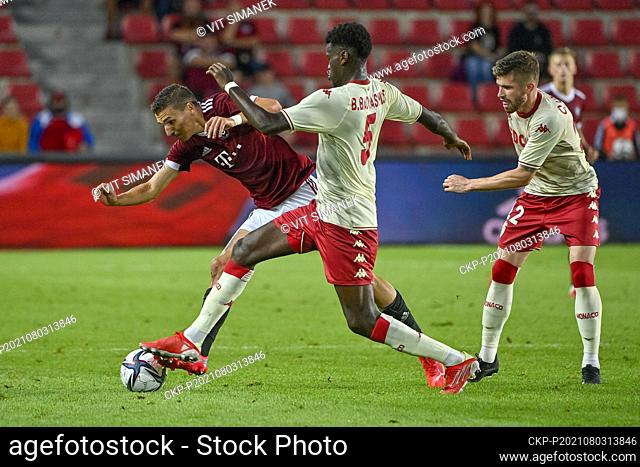 L-R David Pavelka of Sparta and Benoit Badiashile, Caio Henrique, both of Monako in action during the UEFA Champions League 3rd qualifying round soccer match AC...